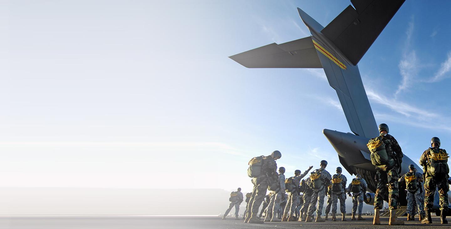 Paratroopers loading onto a C-17 aircraft